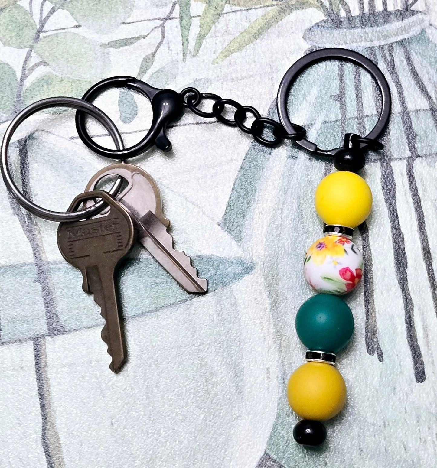 White Floral and Yellow Keyring