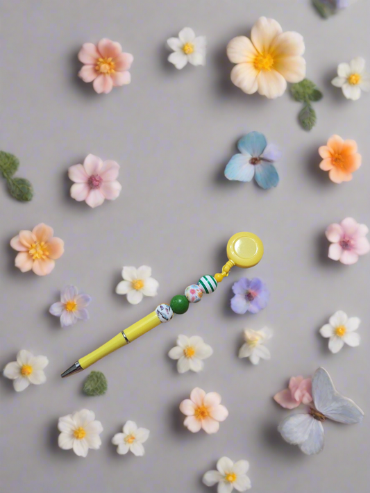 Flower and Butterfly Pen on a Reel